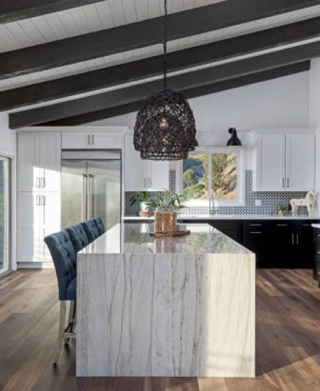 Color photo of a beautiful modern kitchen.